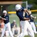 Saline sophomore catcher Trent Theisen makes contact with a ball during a double header against Pioneer on Monday, May 20. Daniel Brenner I AnnArbor.com